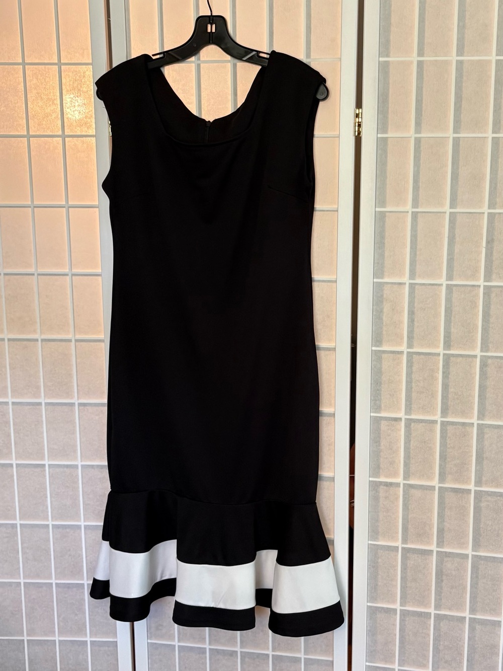 Classic Black and White Sleeveless Ruffle Hem Dress